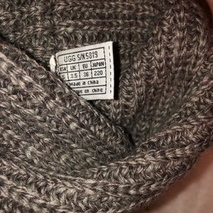 Grey Ugg sweater boots.